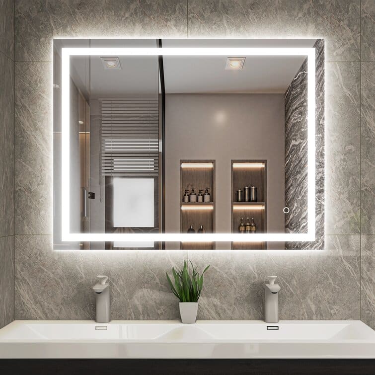 A contemporary bathroom featuring a spacious mirror and dual sinks.